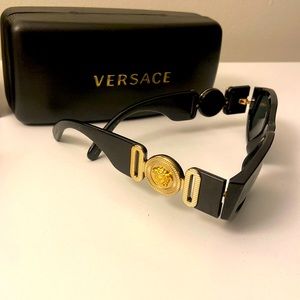 2 pairs of Versace sunglasses